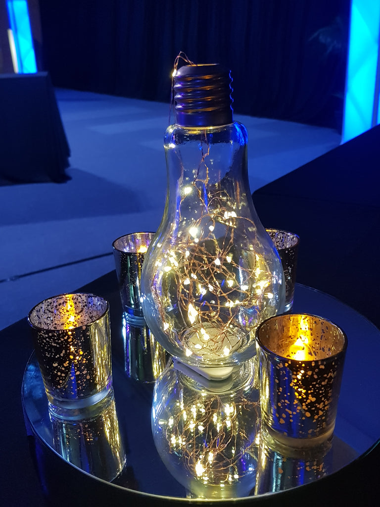 Glass lightbulb Vase w fairy lights - Wellington Wedding Hire